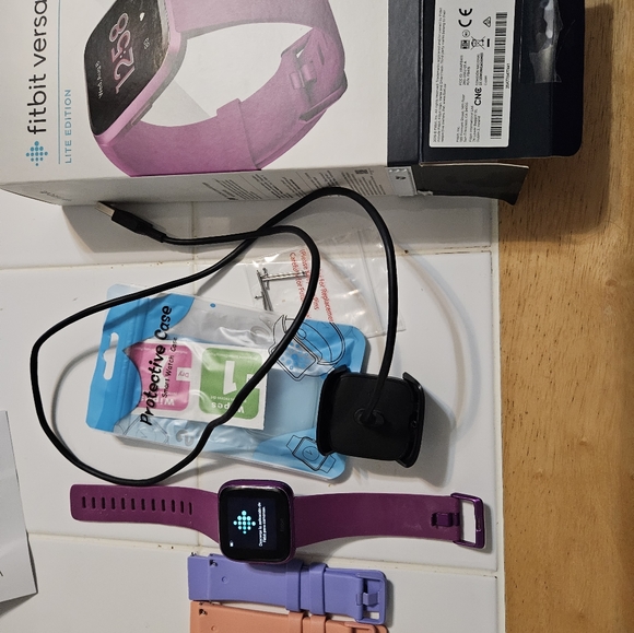Fitbit versa 2 like new bands are brand new never worn. - Picture 2 of 2